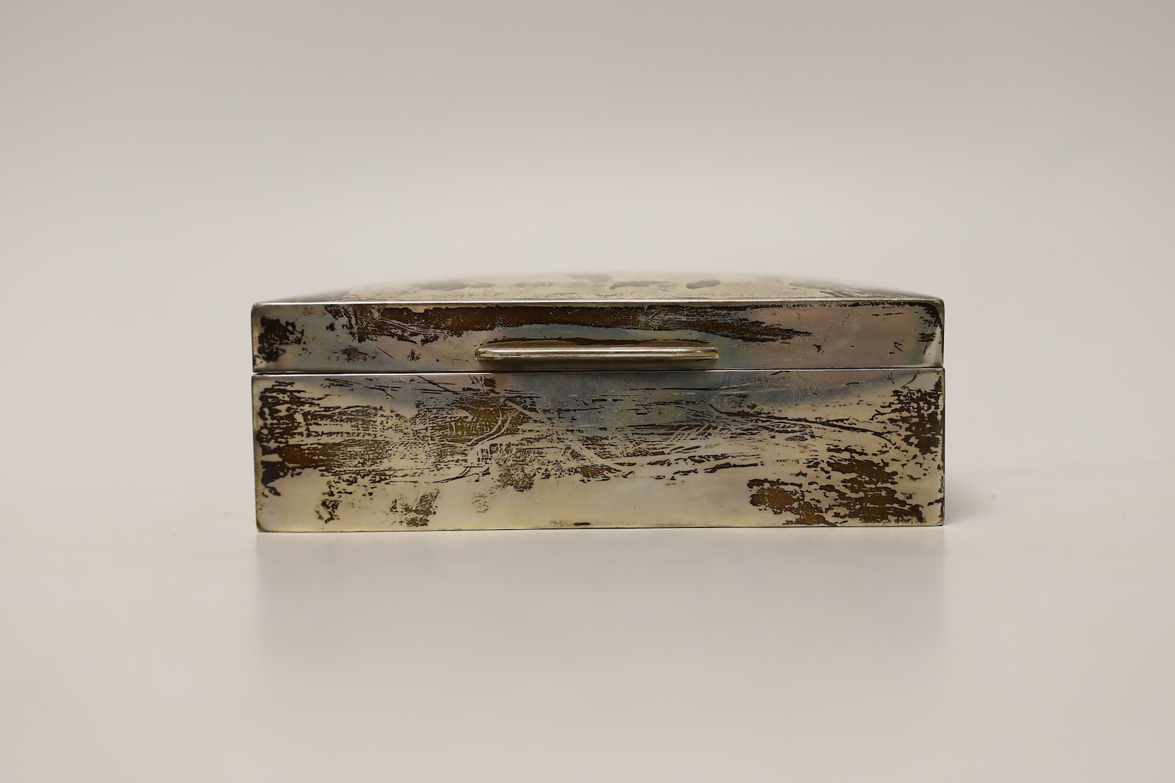 A George V silver mounted rectangular cigarette box, Charles & Richard Comyns, London, 1924, 14cm.